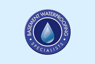 Basement Waterproofing Specialists logo on a blue background.